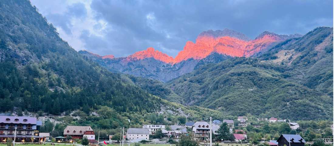 Sunset on peaks surrounding the Theth Valley Albania |  Kate Baker