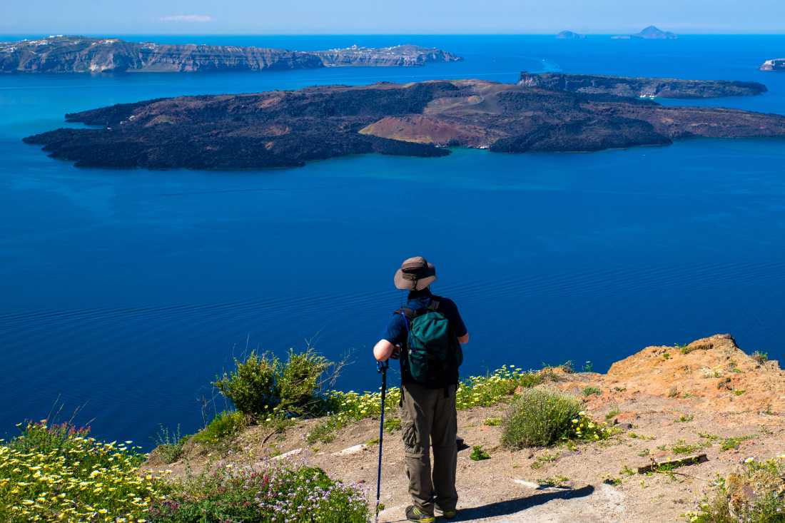 Looking out at Nea Kameni, a volcanic island located in the Santorini caldera in Greece.